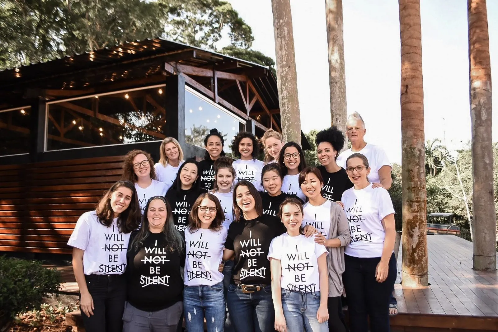 Justice School students together in "I will not be silent" shirts